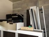 a room with a lot of different types of furniture in it