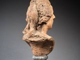 an image of a bust of a woman on a pedestal