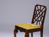 an image of a wooden chair with a yellow seat on a white surface