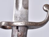 a close up of a sword with a metal handle