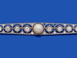 a diamond and pearl broochle ring