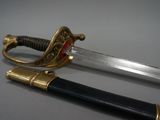 a sword that is sitting on a table