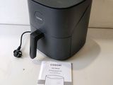 an image of a coffee maker sitting on top of a table