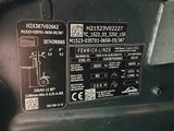 a close up of the back of a car ' s engine