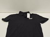 a black polo shirt with a white logo on the chest