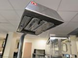 an image of a commercial kitchen with stainless steel appliances