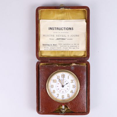 a small brown box with a clock inside of it
