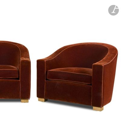 pair of brown velvet club chairs with wooden legs