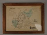 an old map of ireland in a wooden frame hanging on a wall