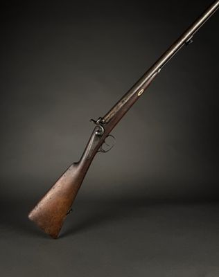 an old rifle on a black background