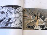 an open book with a picture of a building inside of it