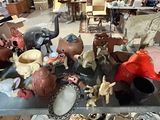 a large collection of toys on a table in a room