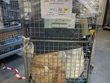 a cage that has a bunch of items in it