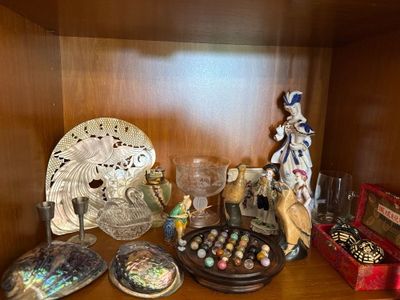 a shelf that has many different items on it