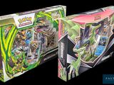 two boxes of pokemon trading cards are shown on a black background