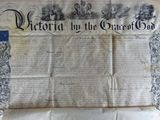 an old document with writing on it sitting on top of a table