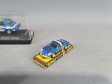 a small toy car that is sitting on a box