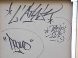 a picture of graffiti written on the door of a building