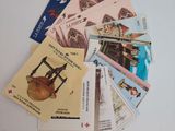 a lot of different cards that are on the table