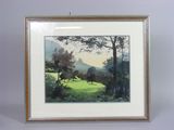 tableau encadré représentant un paysage avec des arbres et de l'herbe