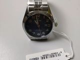 an image of a watch on a table with a price tag on it