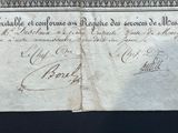 a piece of paper with writing on it on a table