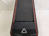 a black and red computer on a white surface