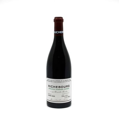 a bottle of wine that is sitting on a table