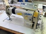 a sewing machine that is sitting on a table