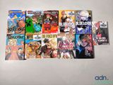 beaucoup de livres sur les anime, tous posés ensemble sur la table
