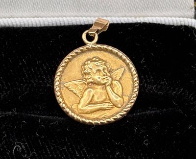 an image of a gold coin with an angel on it