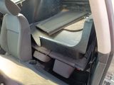 the back seat of a car with a tray in the back of it
