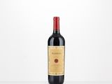 a bottle of red wine sitting on top of a table