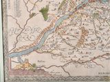 a picture of a map on the wall of a room