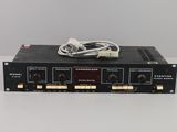 a close up of a radio receiver with wires on top of it