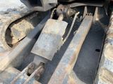 an image of a close up of a bulldozer ' s front end