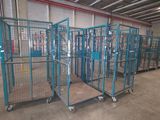 a large room with a lot of cages on the floor