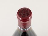 a bottle of wine that is sitting on a table