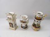 three different pieces of porcelain on a white table