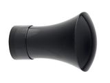 a black speaker that is on a white surface