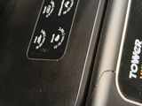 a close up of a toaster that has a sticker on it