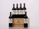 six bottles of red wine in a wooden box on a table