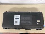 a black box with a label on it sitting on a table