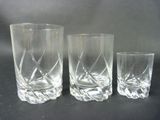 three glasses sitting next to each other on a table
