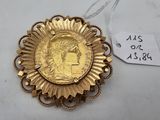 a close up of a gold coin on a necklace with a price tag