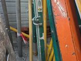 a pile of assorted construction materials sitting on the ground