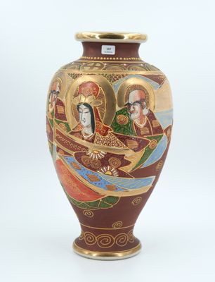 a vase with a picture of a woman and a man on it