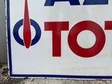 a sign with a red, white, and blue design on it