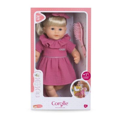 doll with blonde hair and pink dress in a pink box