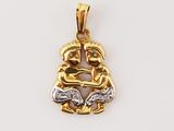 a gold and silver pendant with two hands holding each other